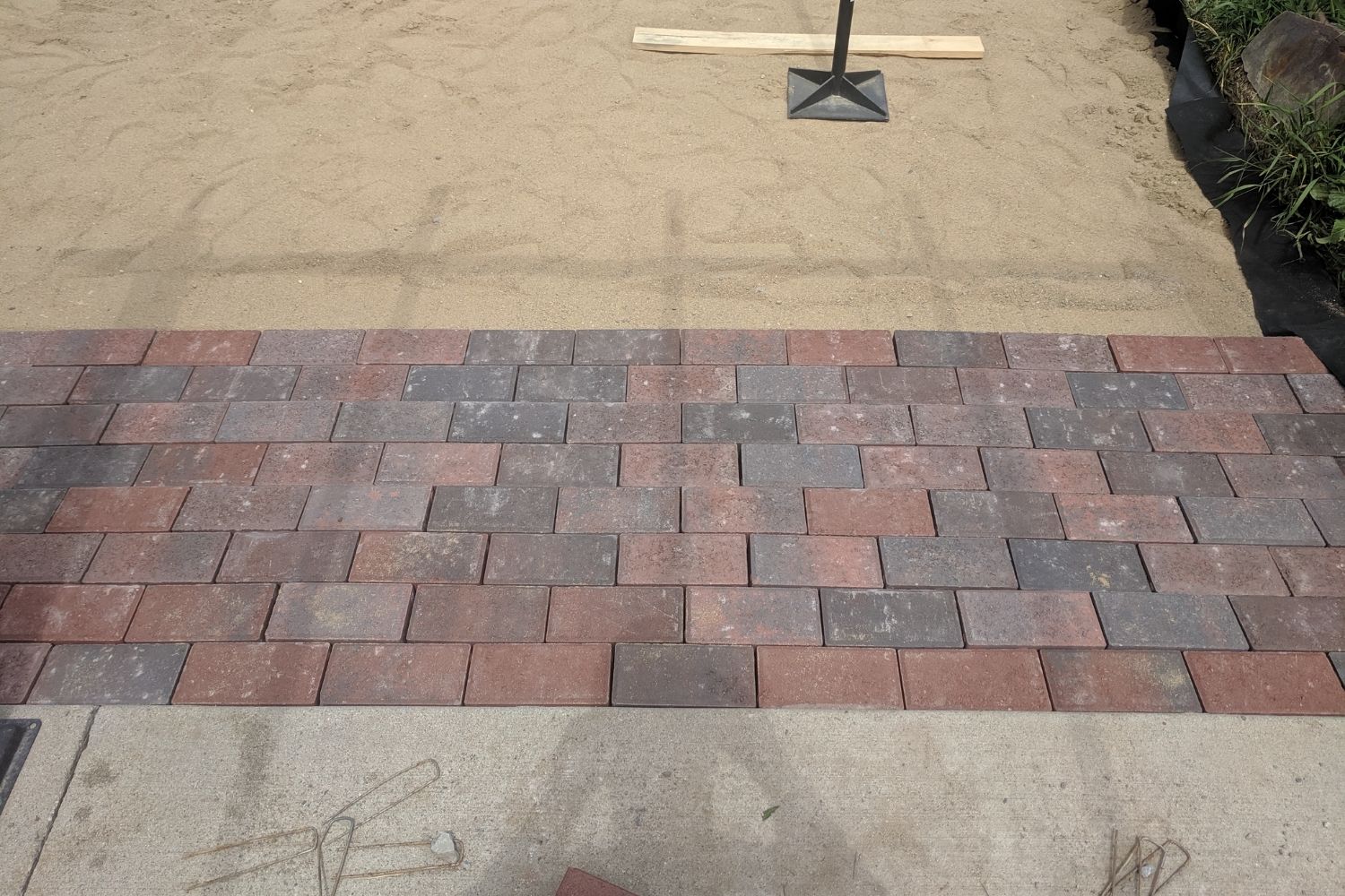 Is laying a brick patio hard to do?